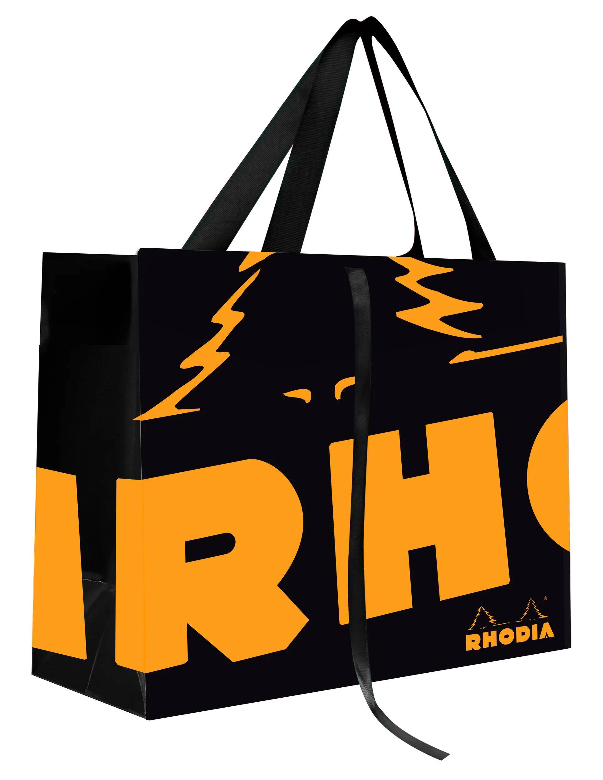 Einkaufstasche der Marke 'Rhodia' mit schwarzen Griffen, die ein großes orangefarbenes Logo und eine Bergzeichnung auf schwarzem Hintergrund zeigt.