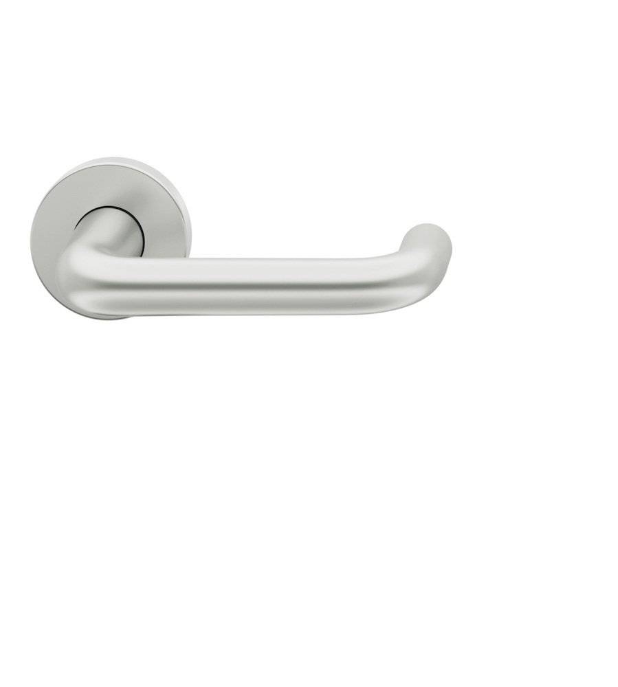 Eine silberne Türklinke mit minimalistische, zylindrischem Design ist auf einer runden Rosette montiert.