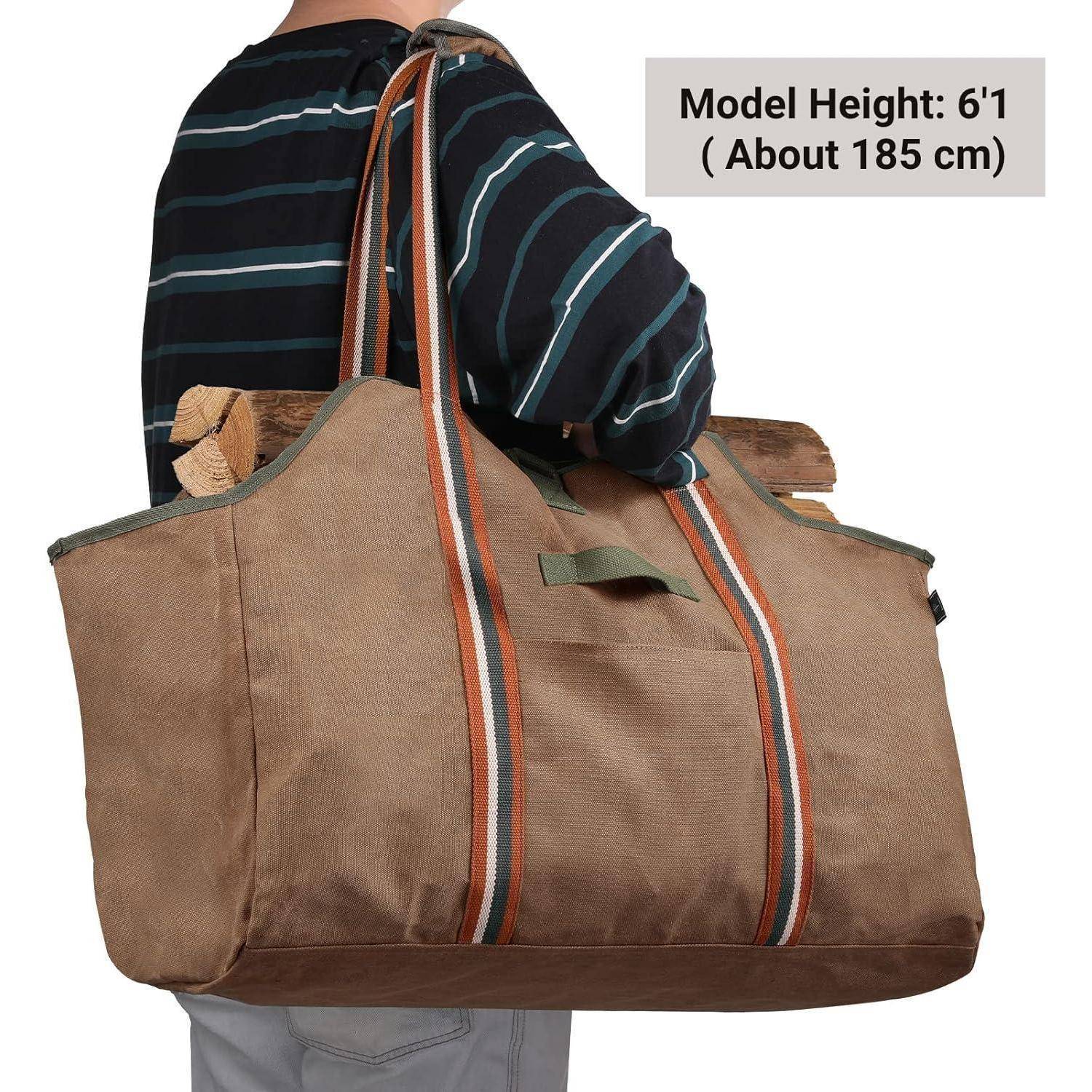 Eine Person trägt eine überdimensionale braune Tasche mit orange und grauen Streifen. Text lautet: 'Modelgröße: 1,85 m'.
