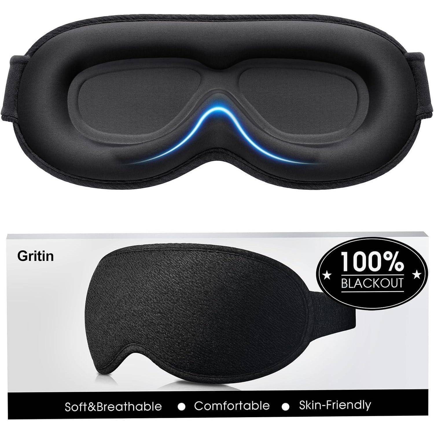 Schwarze Schlafmaske mit blauer Innenseite, gezeigt in einer Verpackung mit der Aufschrift 'Gritin 100% Verdunkelung', beschrieben als 'Weich&Atmungsaktiv', 'Komfortabel', 'Hautfreundlich'.