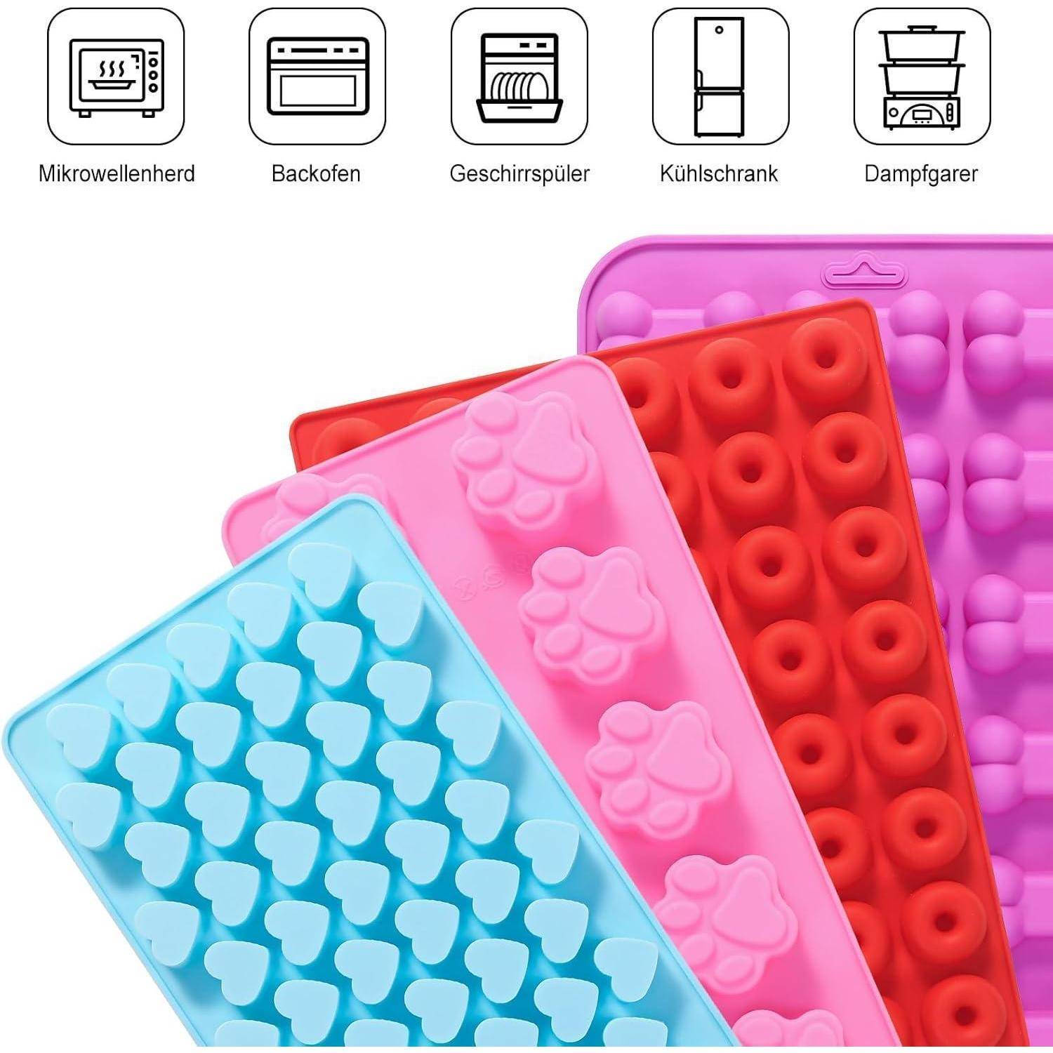 Silikonformen in Blau, Rosa und Rot mit verschiedenen Formen, darunter Herzen und Sterne, geeignet für Mikrowelle und Backofen.