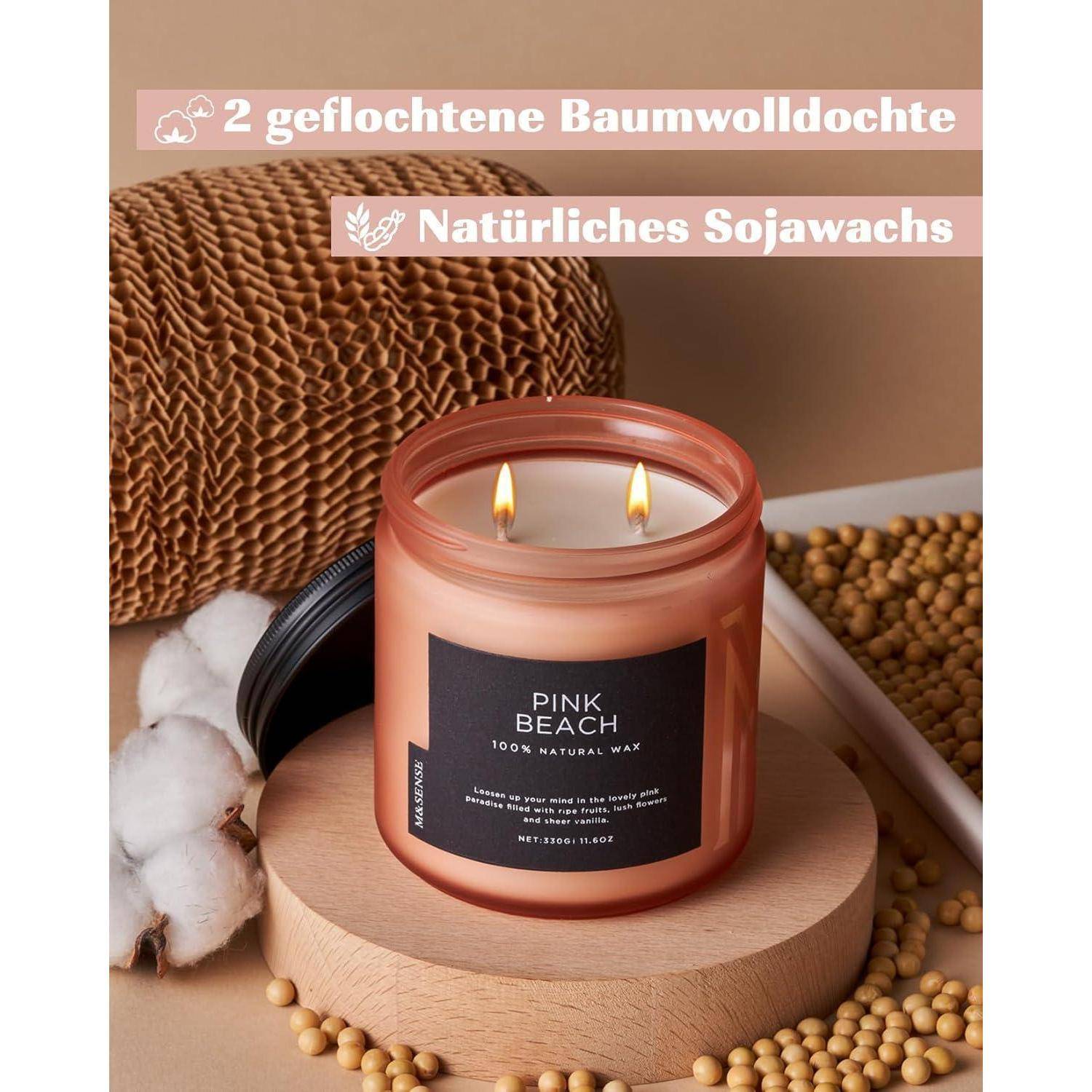 Eine rosa Sojawachskerze mit der Aufschrift 