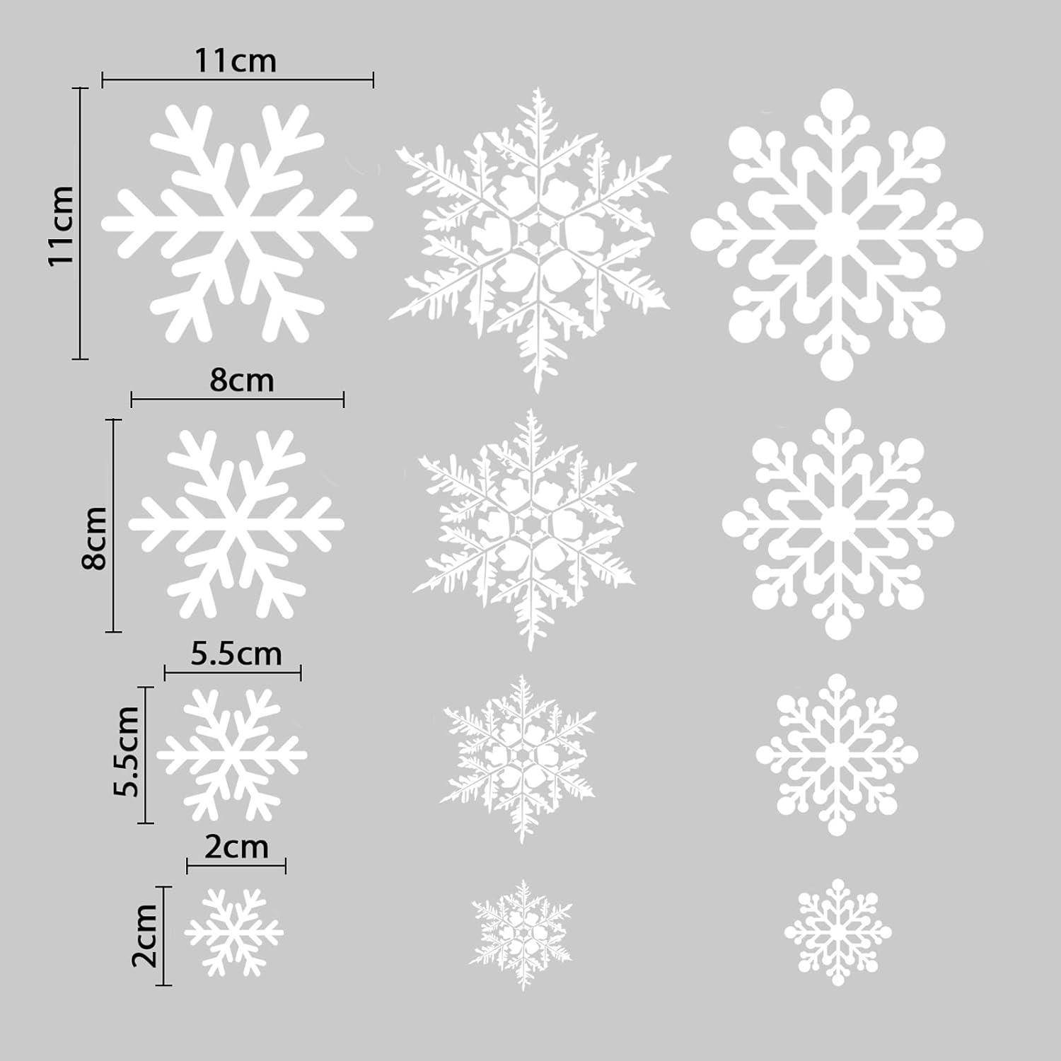 Eine Sammlung von neun weißen Schneeflockendesigns auf grauem Hintergrund, in verschiedenen Größen: 11 cm, 8 cm, 5,5 cm und 2 cm, mit Maßangaben dargestellt.