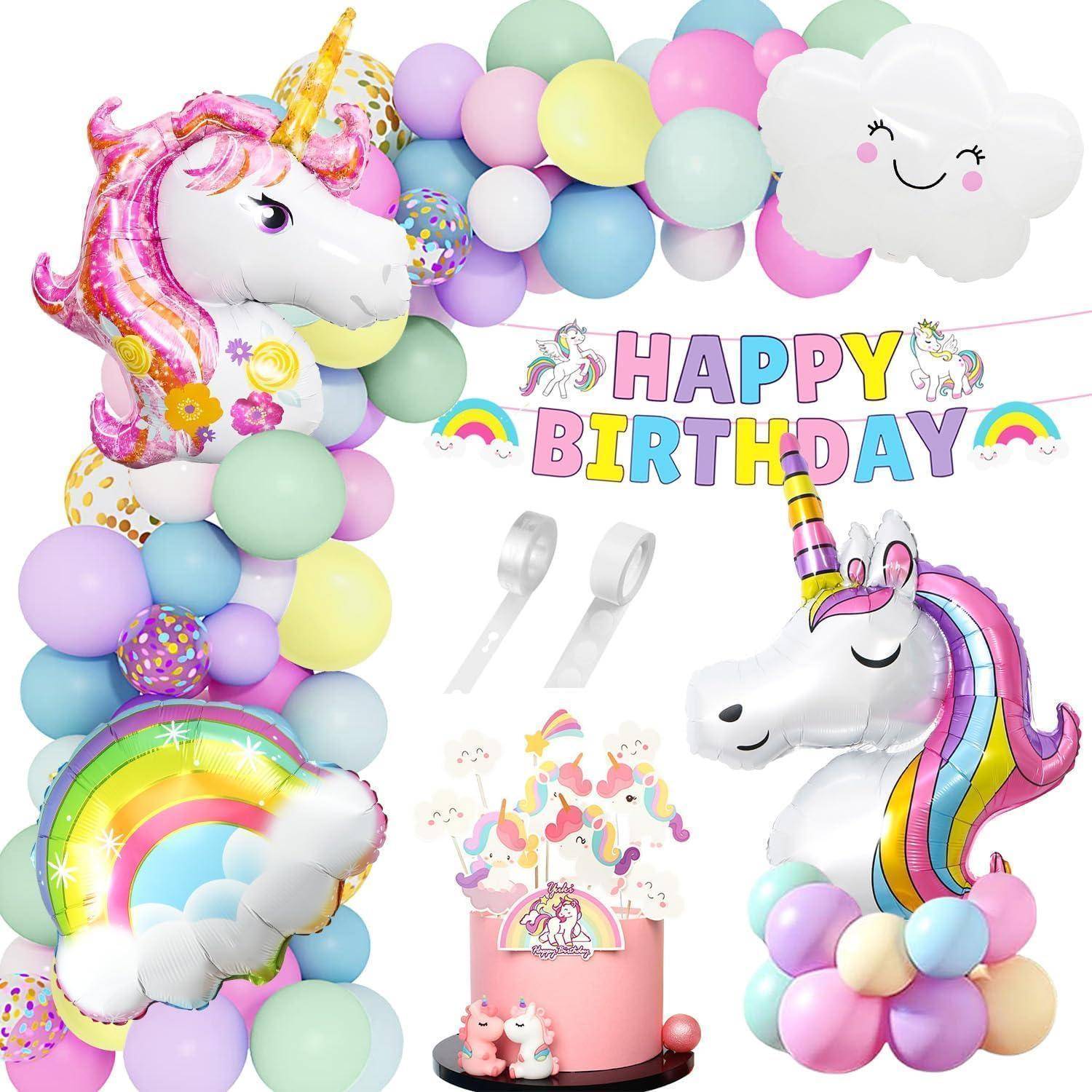 Einhorn-Geburtstagsdekoration mit Regenbogens-Luftballons, einer rosa Torte und einem 