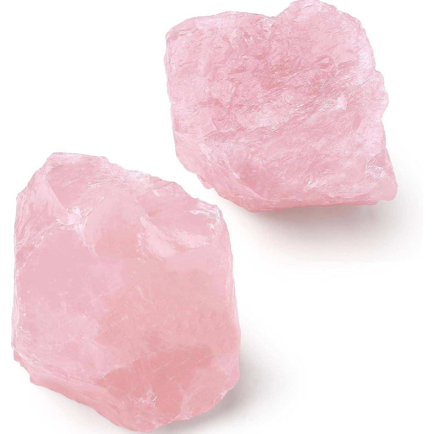 Zwei Stücke roher, rosa Rosenquarz mit einer leicht durchscheinenden und gezackten Textur.