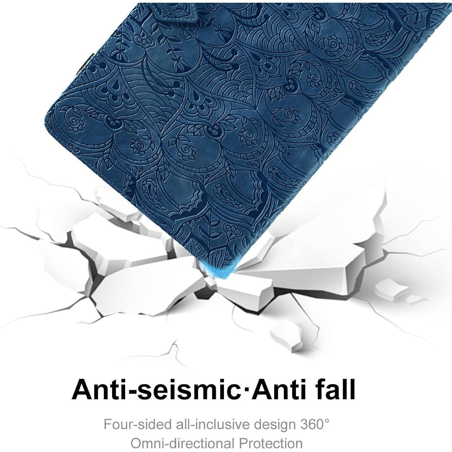 Eine blaue gemusterte Matratzenecke auf einer rissigen Oberfläche, die 