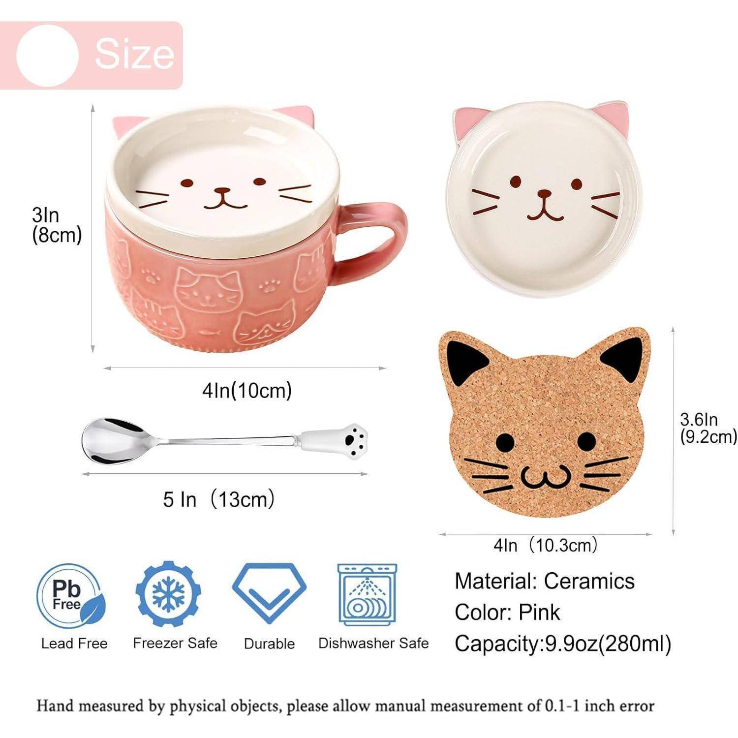 Eine rosa 9,9 Unzen (280 ml) Keramiktasse mit Katzengesichtsdesign, Deckel, Löffel und Untersetzer aus Kork. Aufgeführte Eigenschaften: BPA-frei, geeignet für Gefrierschrank und Spülmaschine.