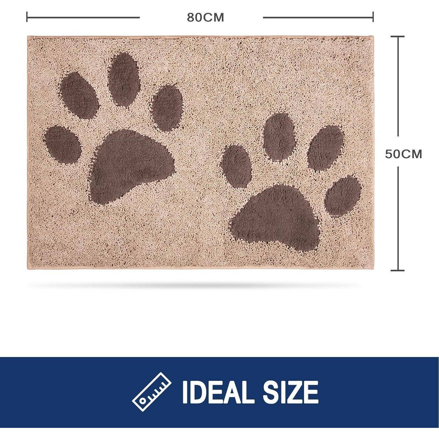 Eine beige Fußmatte mit zwei großen braunen Pfotenabdrücken wird gezeigt. Die Abmessungen sind mit 80 cm Breite und 50 cm Höhe angegeben. Der Text lautet „IDEALE GRÖSSE