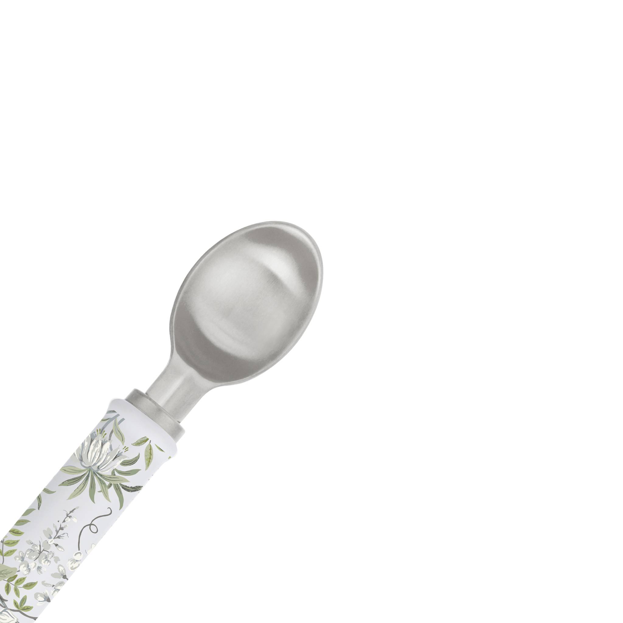 Ein Metalllöffel mit einem Griff in Blumenmuster, das grüne und weiße Designs aufweist.