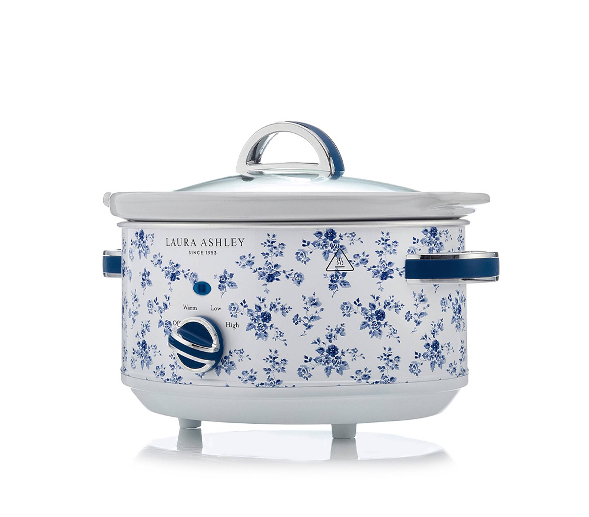 Ein weißer Keramik-Slow Cooker mit blauen Blumenmotiven, ein Bedienungsknopf mit den Einstellungen „Low