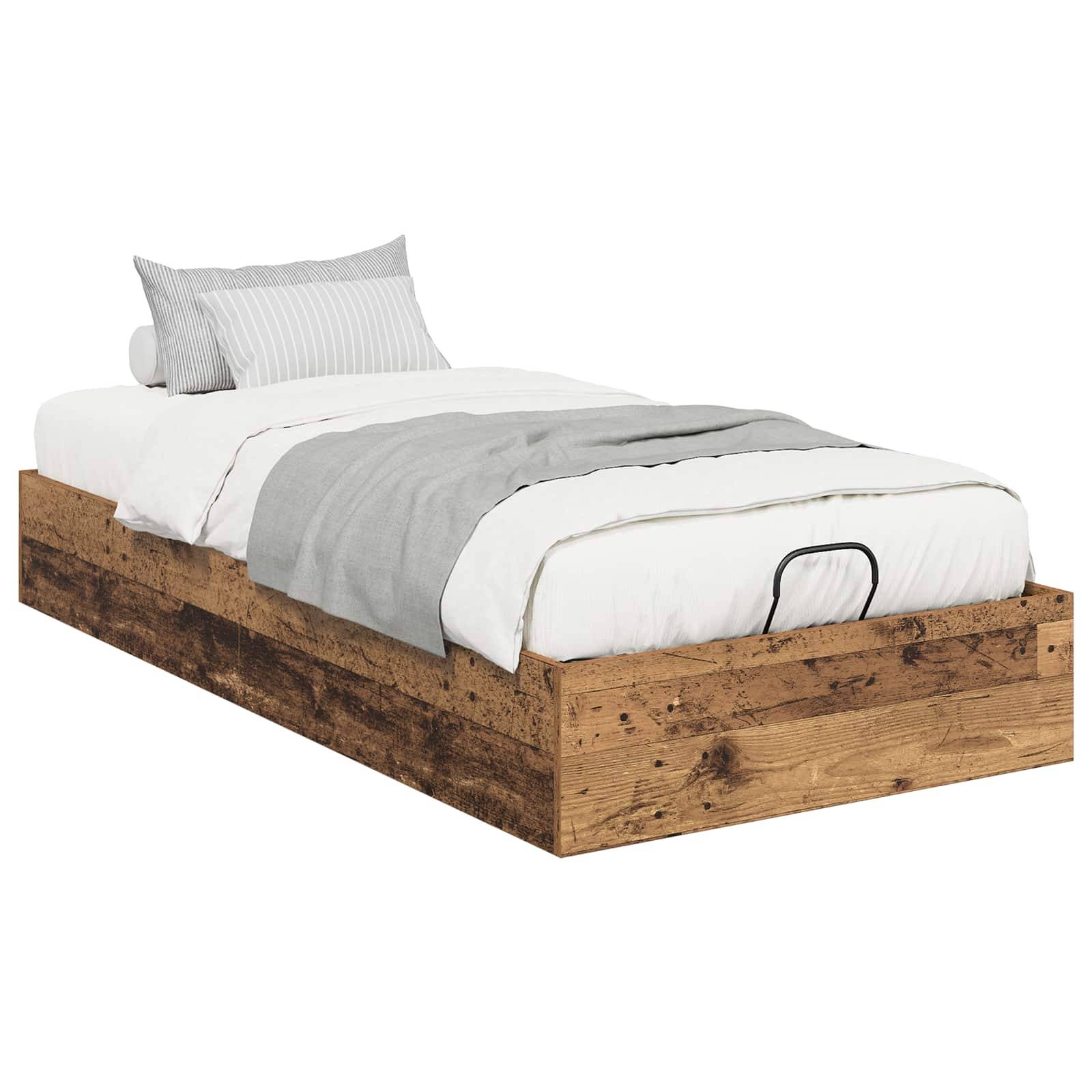 Ein Holzbettrahmen für einzelne Betten mit Schubladen zur Aufbewahrung, weiße Bettwäsche, eine graue Decke und ein gestreiftes Kissen, das einen minimalistischen Look bietet.