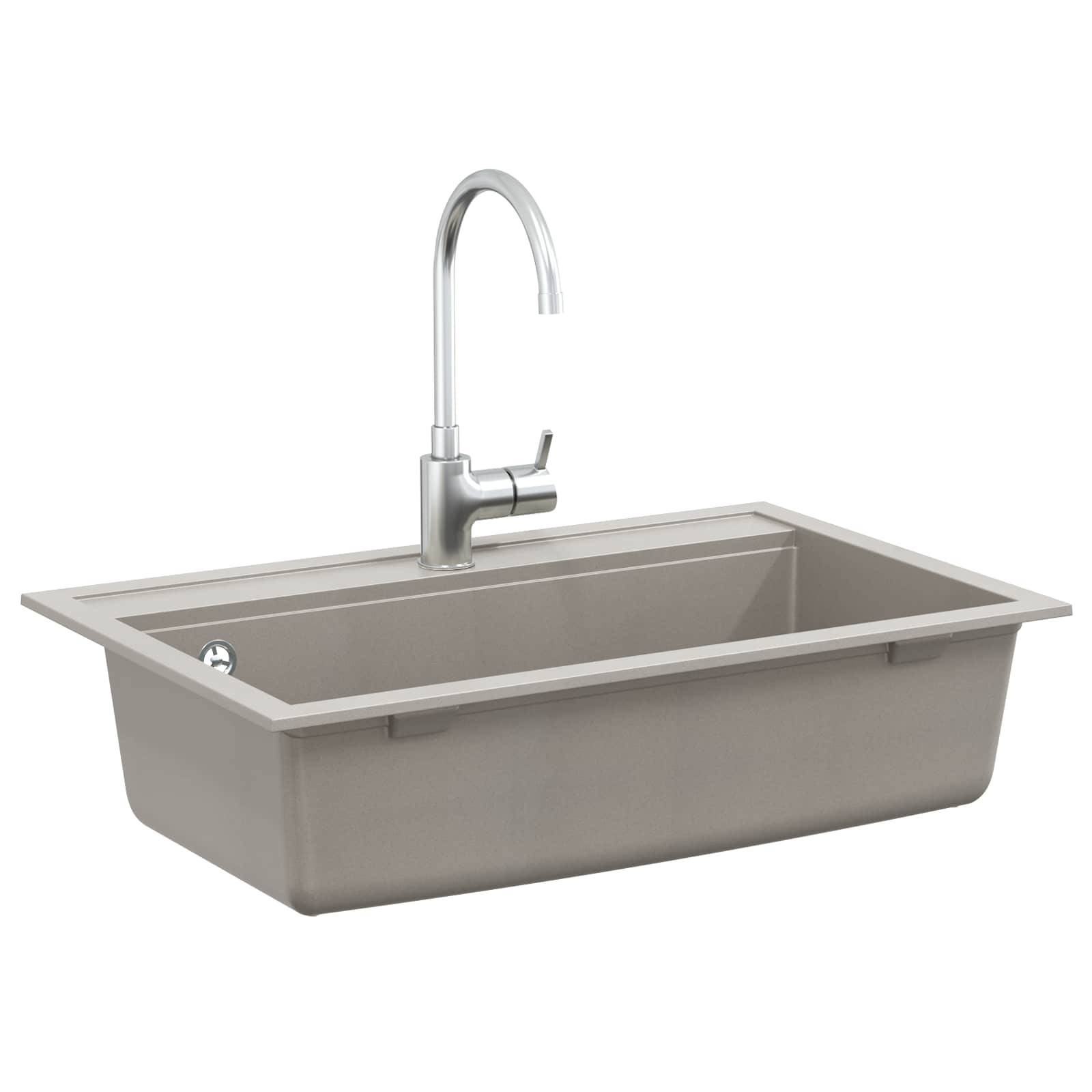 Ein rechteckiges graues Küchenspülbecken mit einem hochbogigen Chromhahn vor weißem Hintergrund.