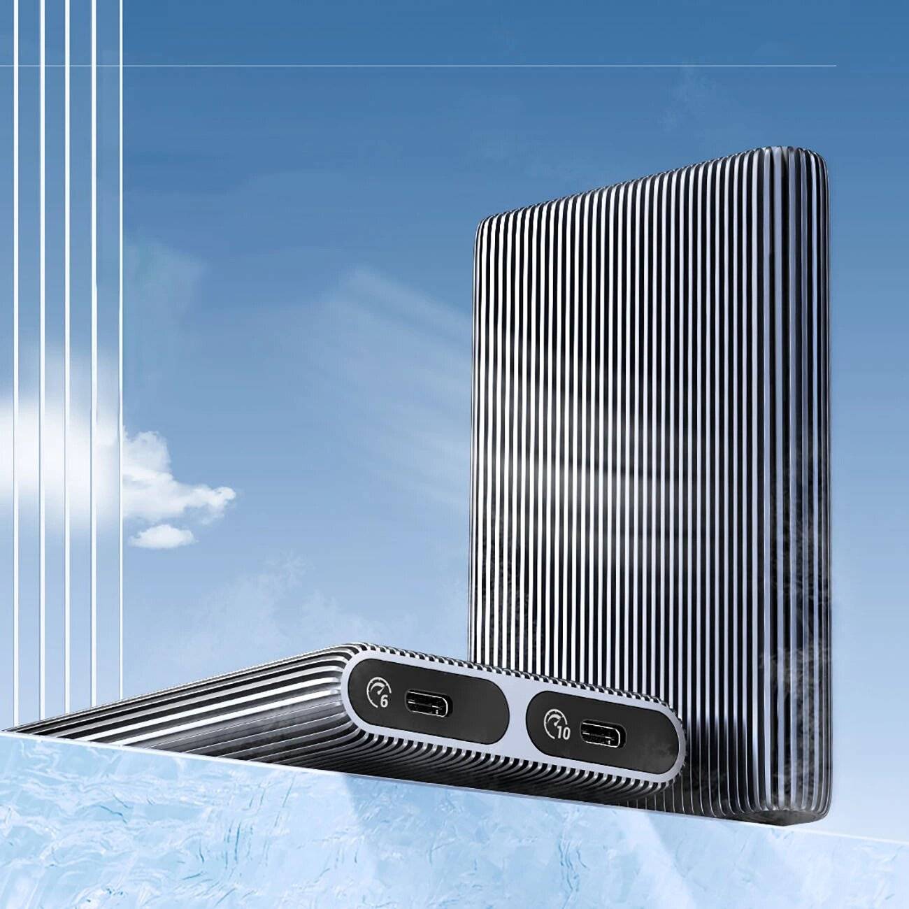 Ein vertikales, modernes tragbares Speicherlaufwerk mit gerilltem Design sitzt vor einem blauen Himmel. Zwei USB-Anschlüsse sind auf seiner Seite sichtbar.