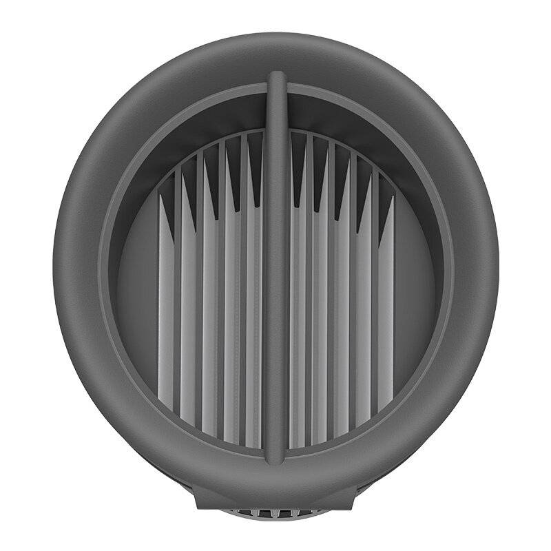 Graues, kreisrundes Objekt mit einem vertikalen Schlitz in der Mitte und gerillten Innenwänden, das einer Lüftungsöffnung oder einem Lautsprechergitter ähnelt.