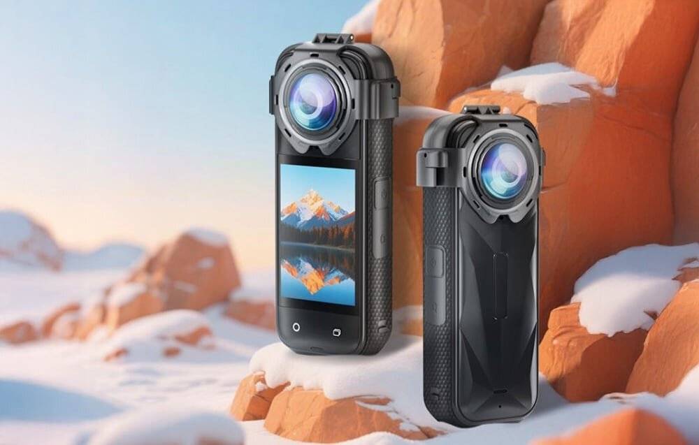 Ein schwarzes digitales Oszilloskop mit mehrfarbigen Wellenformen auf seinem Bildschirm, das in einer Tasche einer schwarz-gelben Tasche platziert ist.