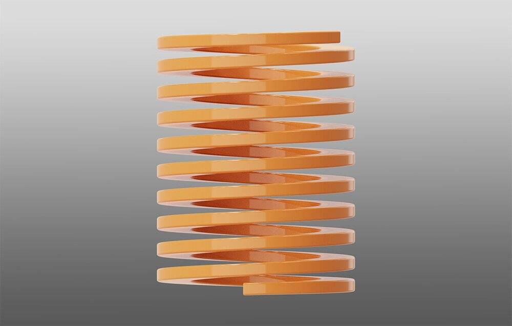 Eine orangefarbene Spiralfeder steht vertikal vor einem grauem Farbverlaufshintergrund und veranschaulicht Zug- oder Druckkräfte.