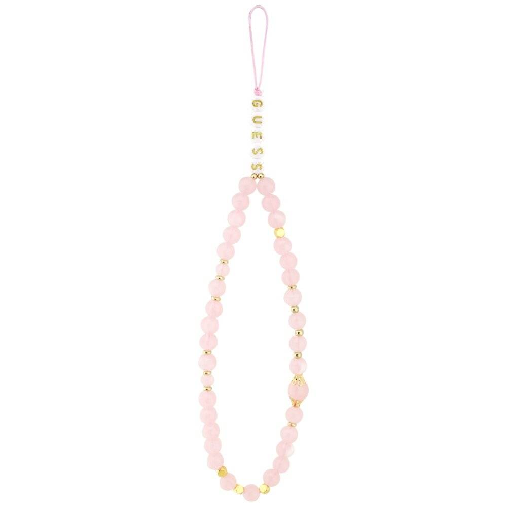 Ein rosa Perlenarmband mit goldenen Akzenten, auf dem das Wort „GUESS