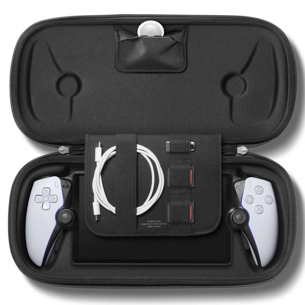 Offene schwarze Schachtel mit einer Spielkonsole, zwei weißen Controllern, einem Ladekabel und Aufbewahrungsfächern für Zubehör.