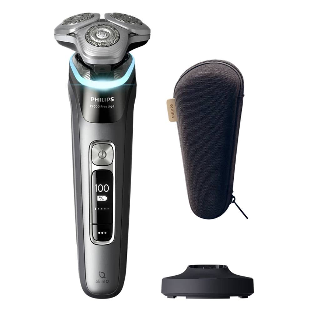 Philips Elektrorasierer mit digitaler Anzeige, Ladebasis und Reisetasche, präsentiert elegantes Design und moderne Rasurtechnologie.