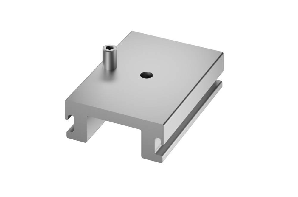Eine rechteckige Metallhalterung mit einer zylindrischen Vorsprung und einem zentralen Loch, wahrscheinlich zur Montage oder Befestigung von Ausrüstung verwendet.