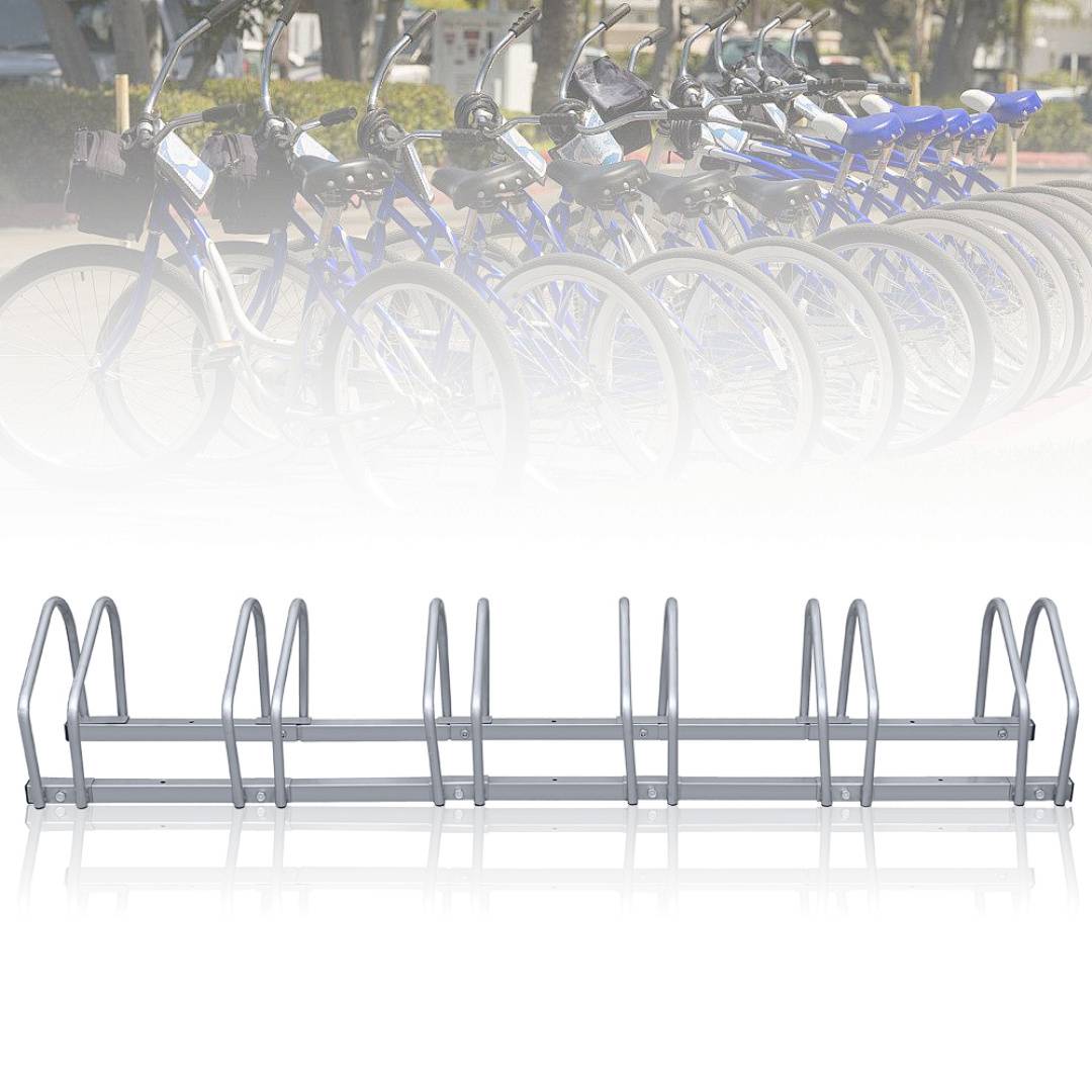 Leeres Fahrradständer mit verblasstem Bild von geparkten Fahrrädern dahinter