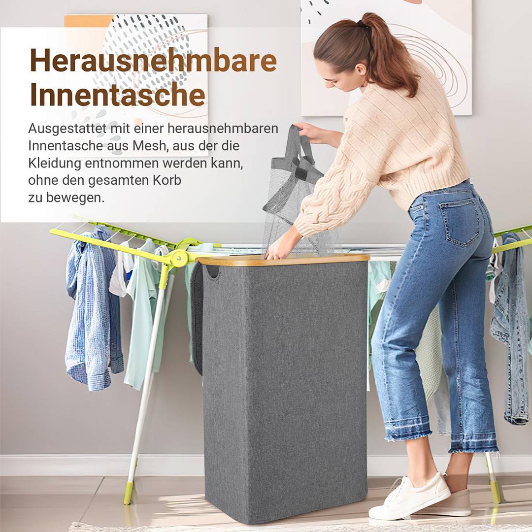 Eine Person entnimmt Wäsche aus einem Stofflagerbehälter mit Holzdeckel. Ein Wäscheständer mit Kleidung steht dahinter. Der Text ist auf Deutsch.