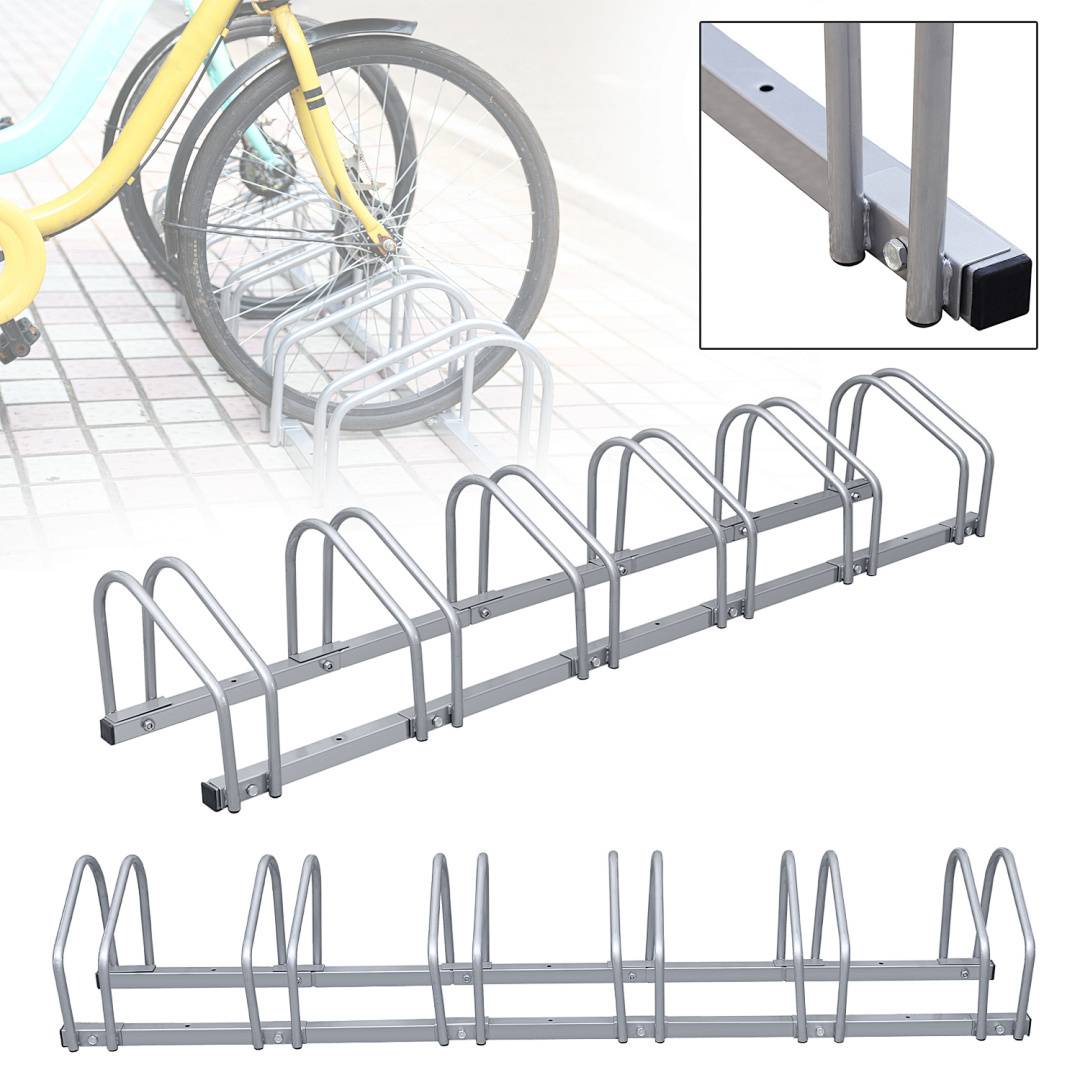 Metallfahrradständer mit mehreren Plätzen zum Parken von Fahrrädern, gezeigt mit einem Fahrradreifen in einem Platz. Die Einblendung zeigt den Montagepunkt des Ständers.