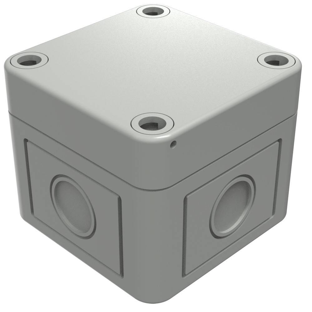 Eine graue elektrische Verteilerdose mit kubischer Form, mit kreisförmigen Ausschnitten an den Seiten und Schraubenlöchern oben zur Befestigung.