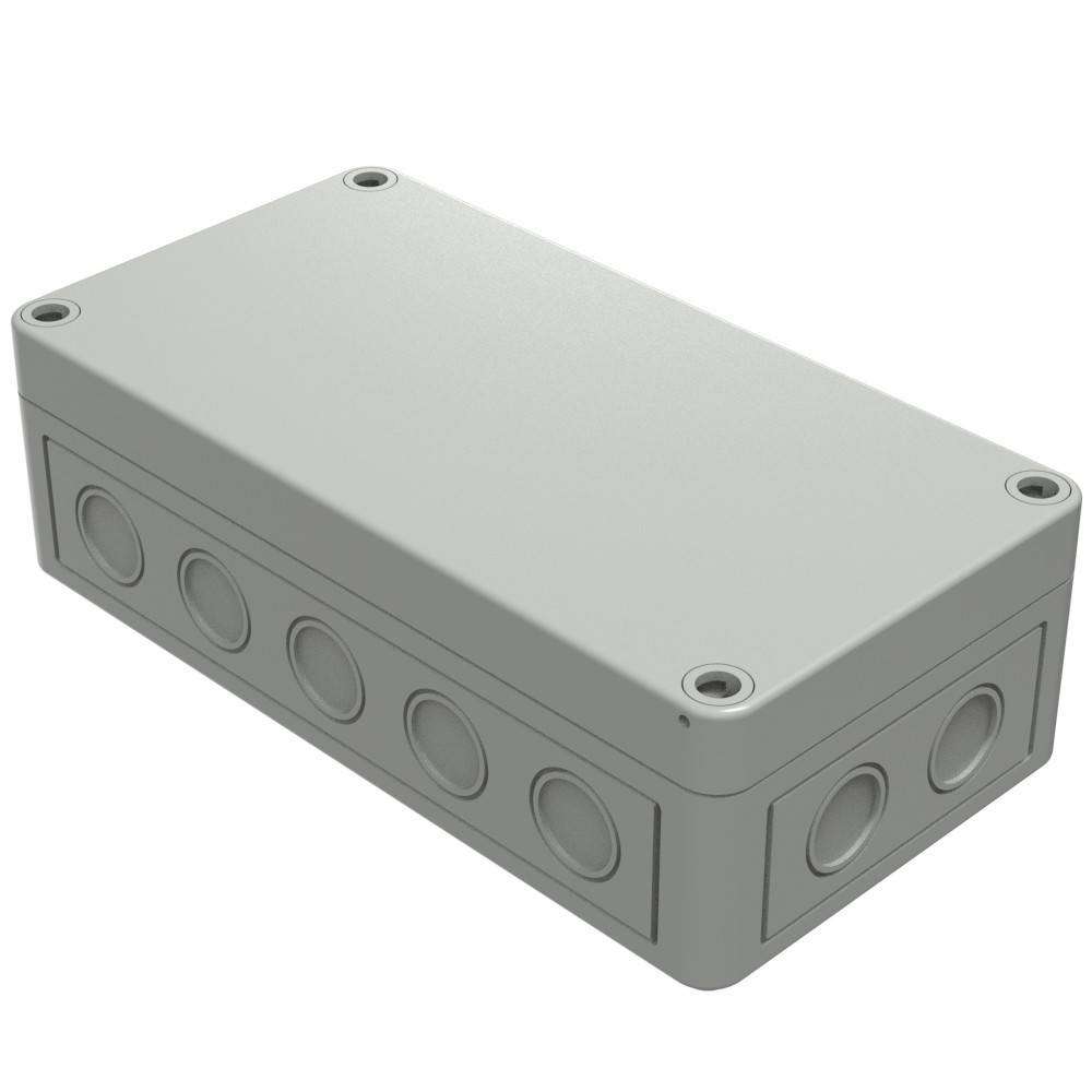 Ein rechteckiger grauer elektrischer Verteilkasten mit mehreren kreisförmigen Ausschlägen an den Seiten, der zur Unterbringung und zum Schutz von elektrischen Verbindungen verwendet wird.