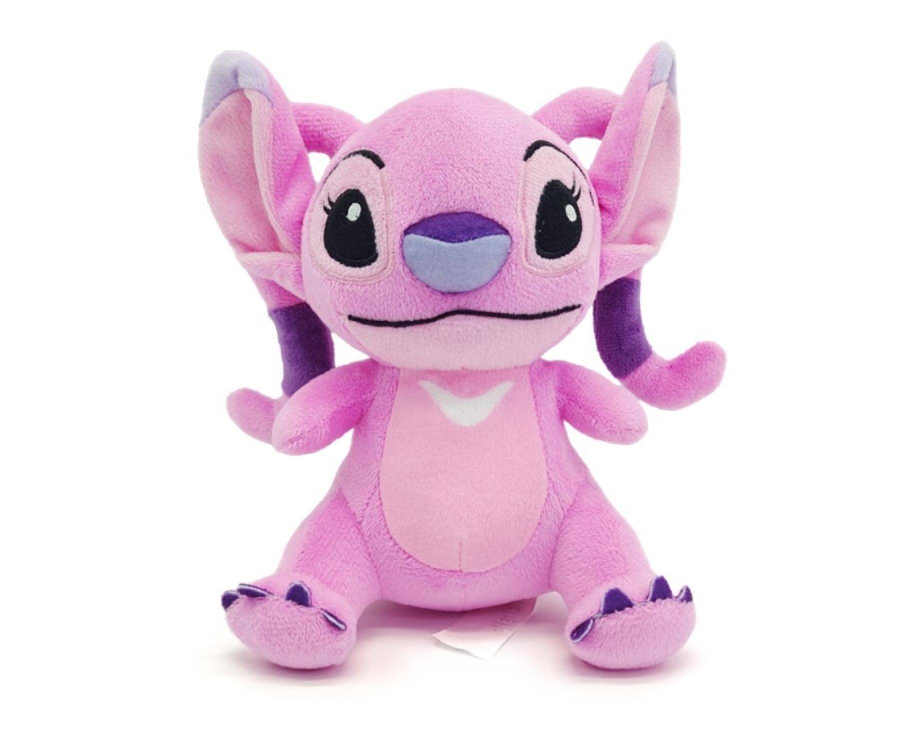 Ein rosa Plüschtier mit großen Ohren, großen Augen und einer kleinen Nase, das einer außerirdischen Kreatur ähnelt, sitzt aufrecht.