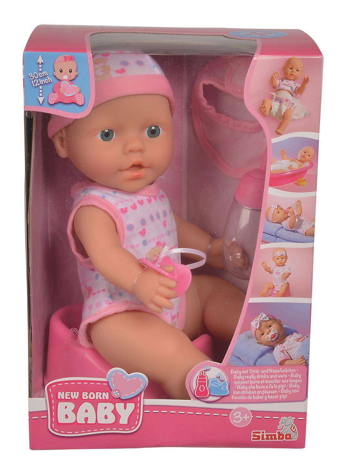 Eine Puppe in Verpackung mit Babyzubehör, gekleidet in einem rosa Outfit. Die Schachtel zeigt Funktionen wie Trinken und Nässen und bewirbt Spielspaß.