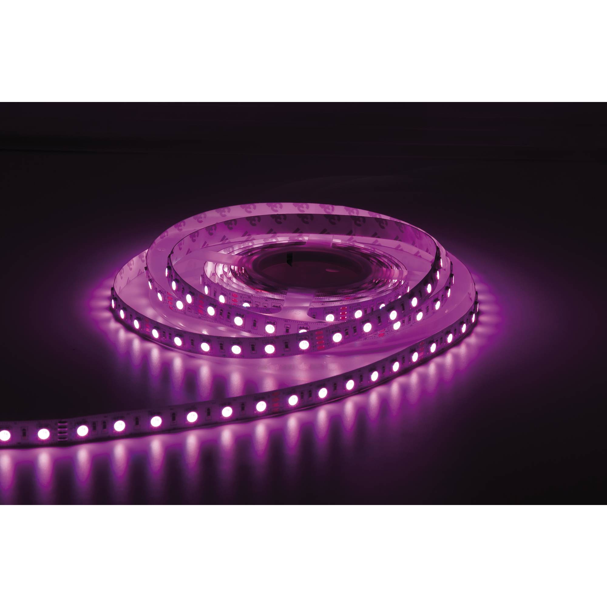 Ein aufgerolltes rosa LED-Lichtband gibt ein sanftes Licht auf dunklem Hintergrund ab und zeigt dabei seine Flexibilität und leuchtende Helligkeit.