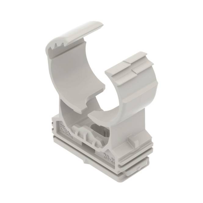 Graue Kunststoffklemme mit schwenkbarem Verriegelungsmechanismus, entwickelt zum Sichern von Rohren. Sie verfügt über eine gerillte Basis für stabile Montage.