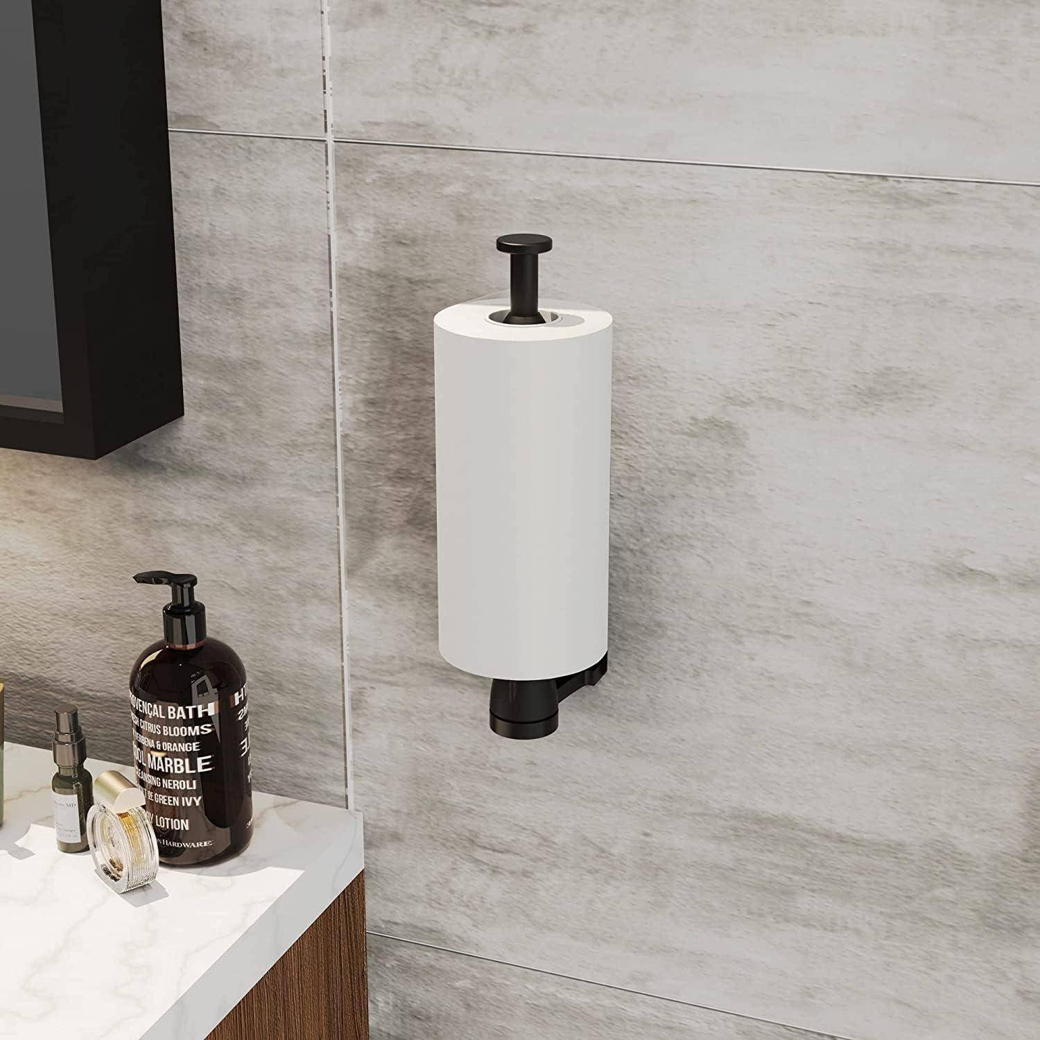 Ein modernes Badezimmer mit einem wandmontierten weißen Papiertuchhalter, einem Seifenspender mit der Aufschrift „SWEET BATHROOMS