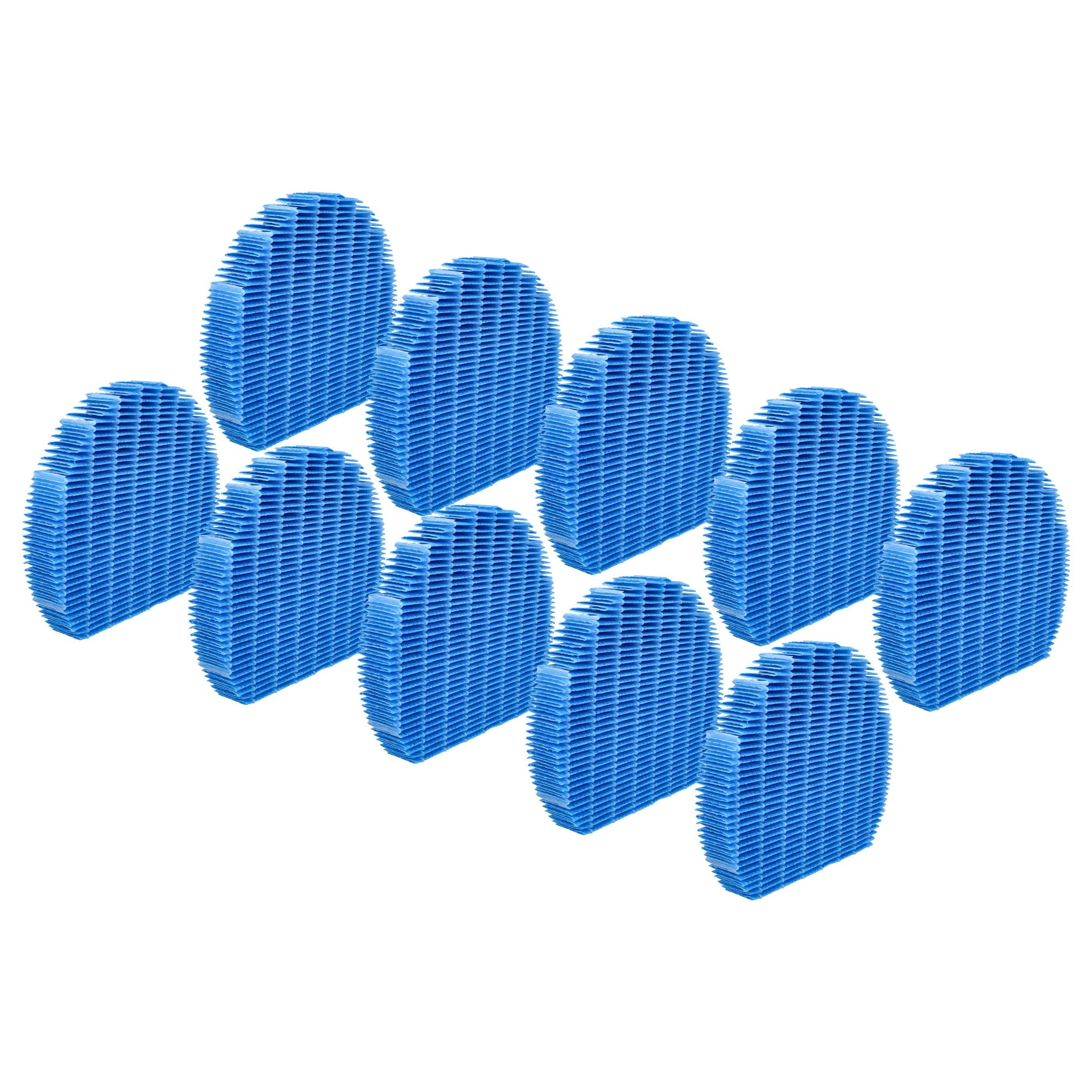 Blaue zylindrische Objekte in einem Rastermuster auf weißem Hintergrund angeordnet, die wie eine moderne Kunstinstallation oder architektonische Designelemente wirken.