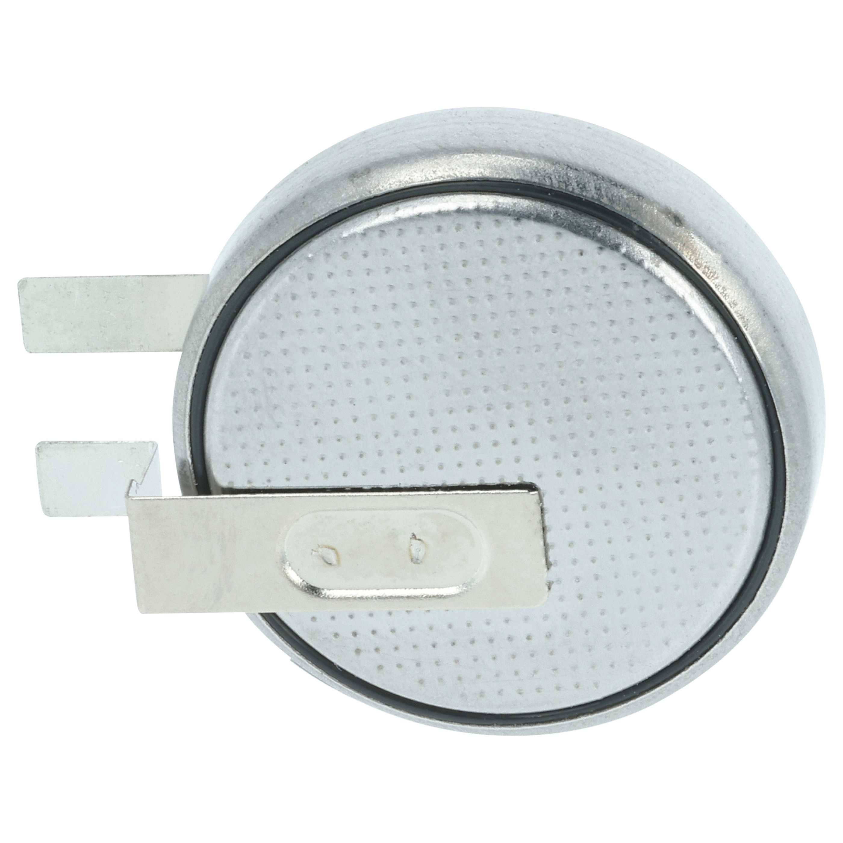 Eine Metallknopfzellenbatterie mit zwei flachen Anschlüssen, die häufig in kleinen elektronischen Geräten wie Uhren und Taschenrechnern verwendet wird.