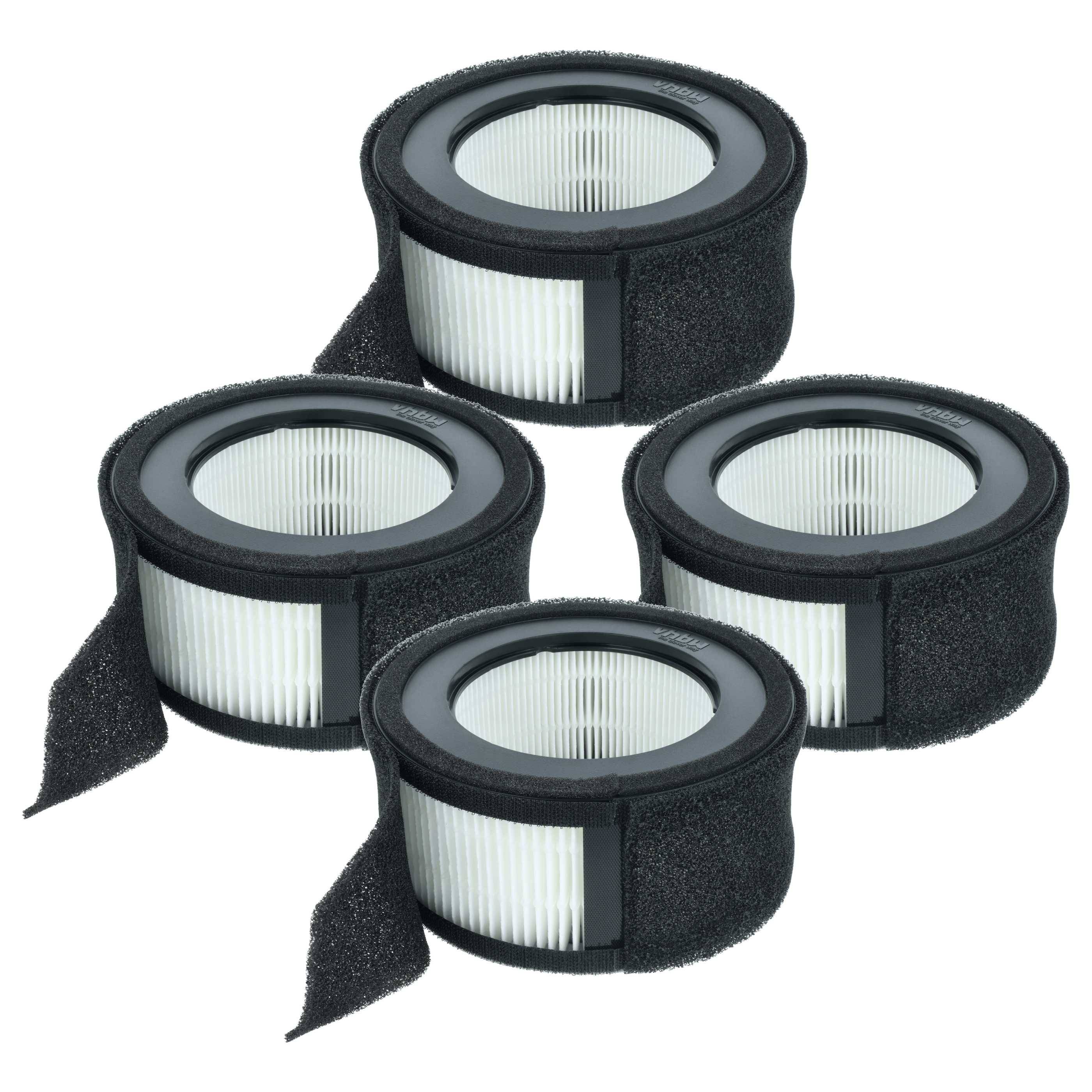 Vier runde, schwarze Luftreinigungsfilter mit gefalteten weißen Innenseiten sind auf weißem Hintergrund angeordnet. Jeder Filter hat eine schwarze Schaumstoffaußenschicht.