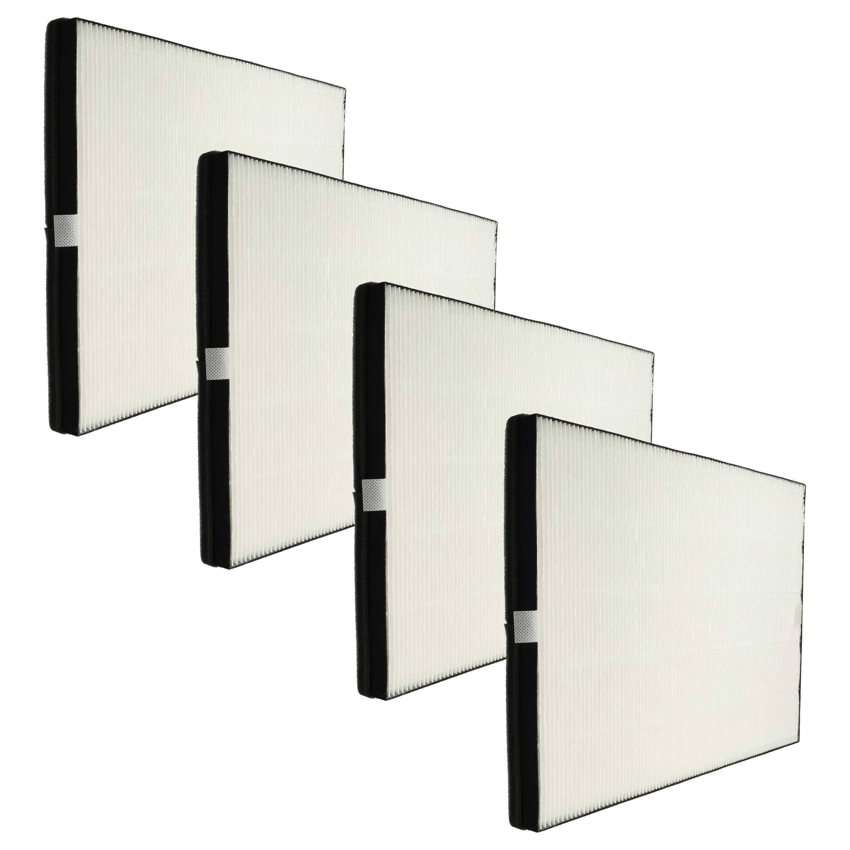 Vier identische weiße rechteckige Luftfilter mit schwarzen Kanten sind in einer versetzten Reihe angeordnet und deuten auf einen Austausch oder Vergleich hin.