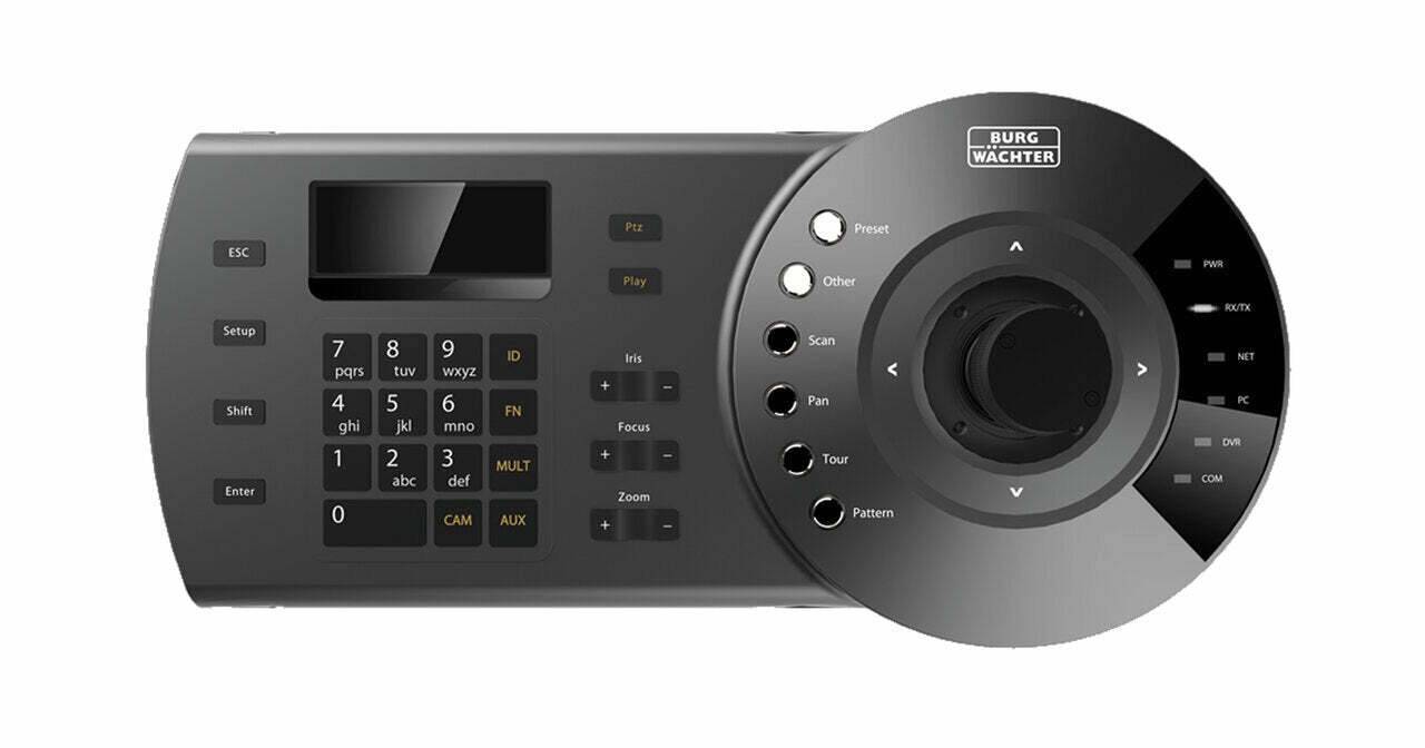 Ein schwarzes Sicherheitskontrollpaneel mit einer numerischen Tastatur und einem runden Joystick mit der Aufschrift „Burg Wachter