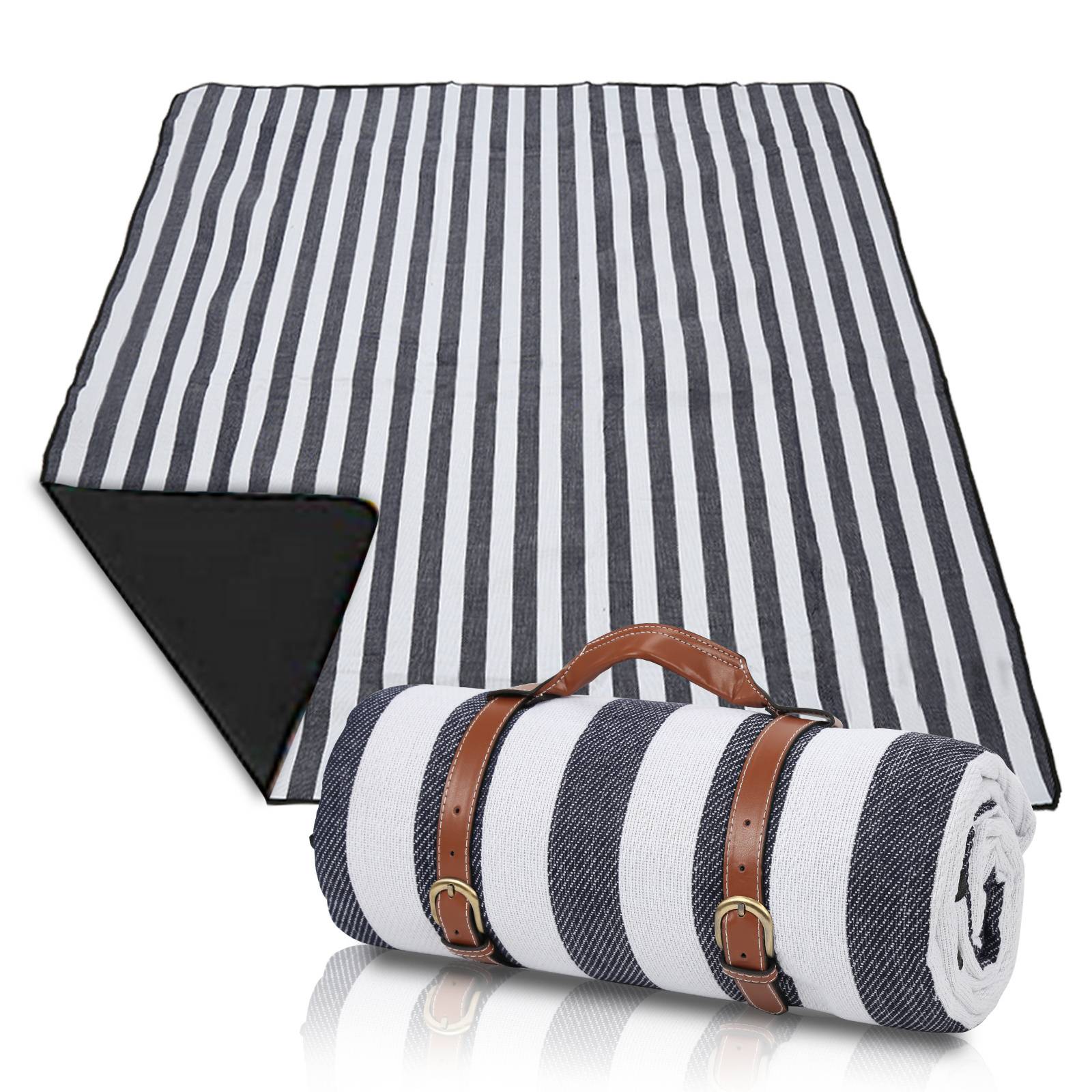 Eine aufgerollte schwarz-weiß gestreifte Decke mit Ledergurten wird neben einer geöffneten Version derselben Decke präsentiert.