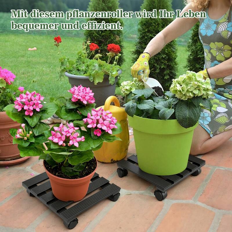A person arranges flowering potted plants on wheeled plant stands on a patio. With this plant roller, your life will become more comfortable and efficient.