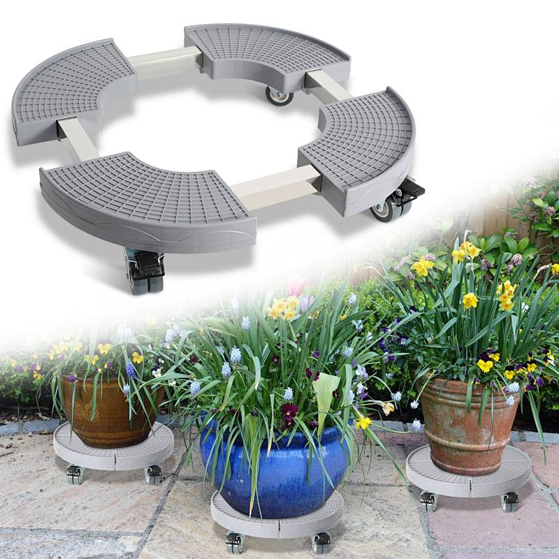 Ein rundes, verstellbares Pflanzentablett mit Rädern, das unter Topfpflanzen verwendet wird, um deren mühelose Bewegung zu ermöglichen und die Dekoration zu verbessern.