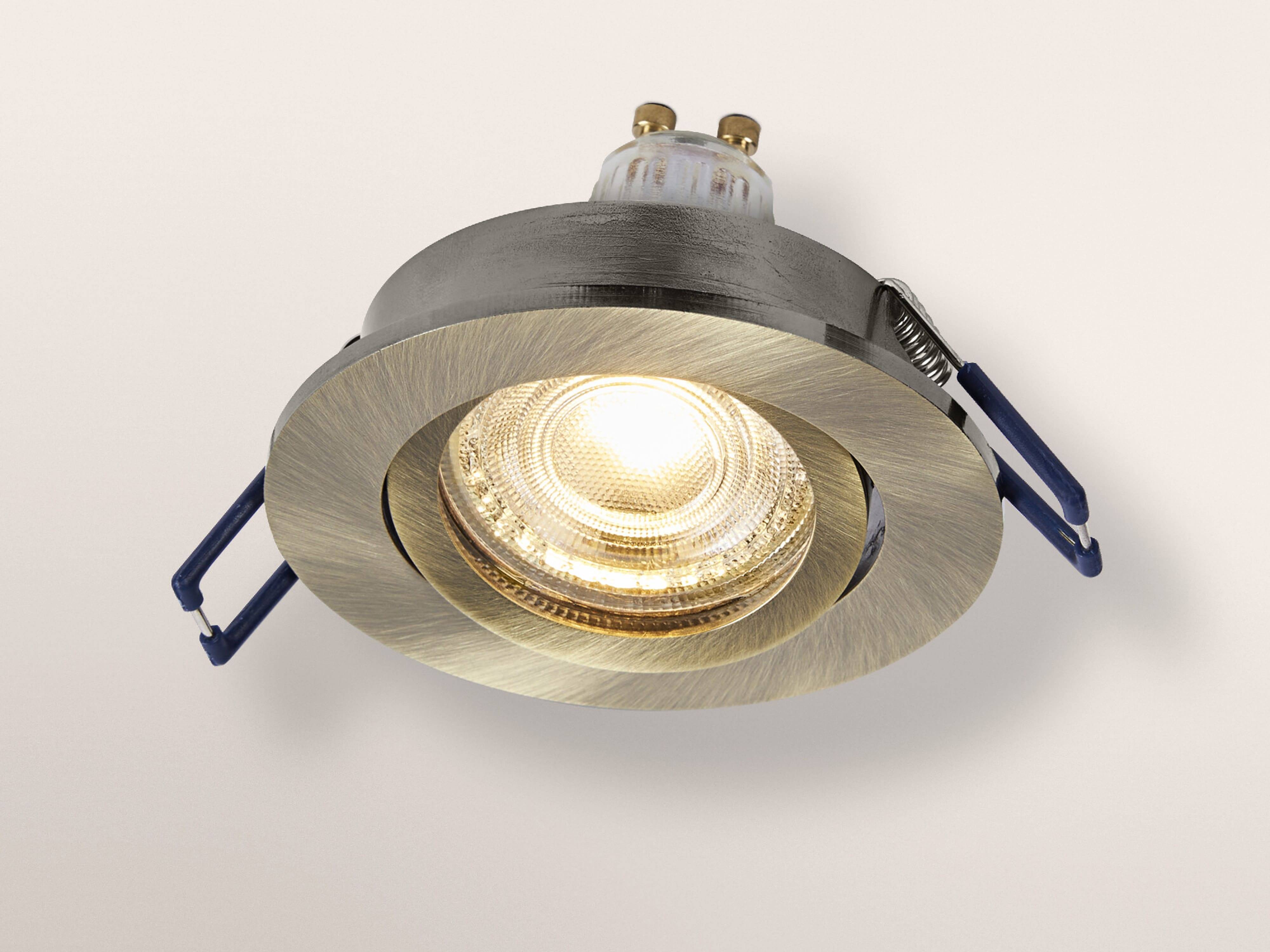 Ein runder, versenkt eingebauter Deckenspot mit metallischer Oberfläche, konzipiert für die Innenbeleuchtung. Er verfügt über verstellbare Scharniere an den Seiten.