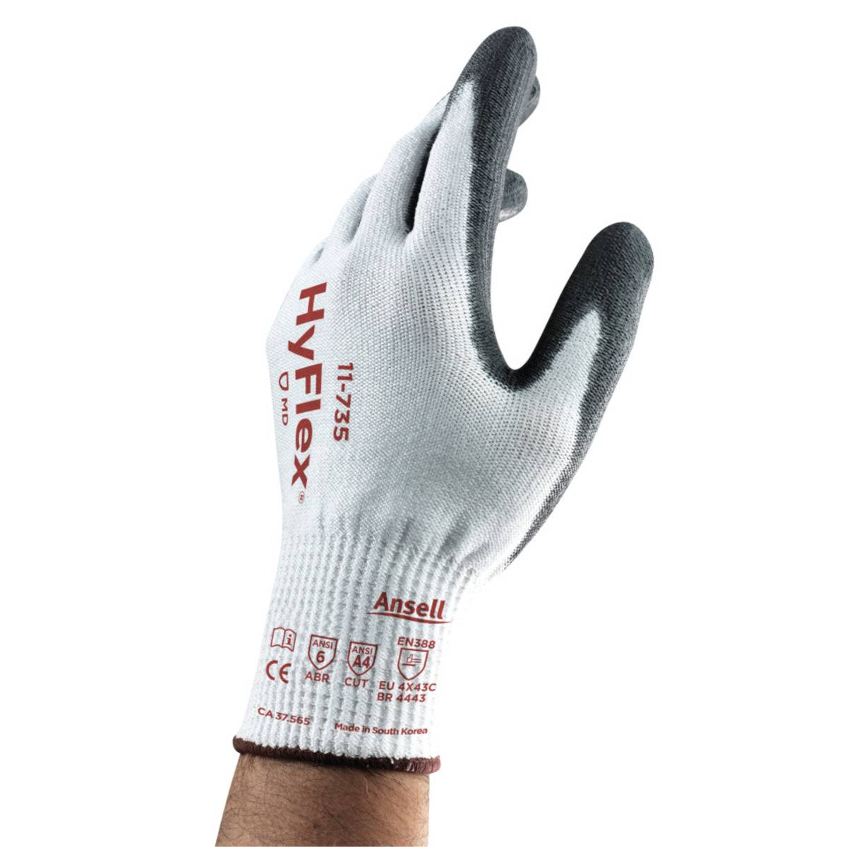 Eine Nahaufnahme eines weißen Schutzhandschuhs mit der Bezeichnung „Ansell HyFlex 11-735