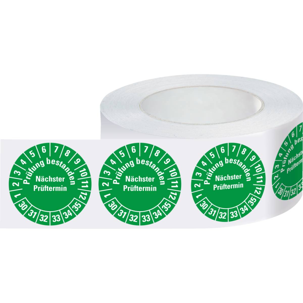 Eine Rolle Inspektionsaufkleber in Grün mit den Nummern 1-36 rund herum und dem Text „Prüfung bestanden