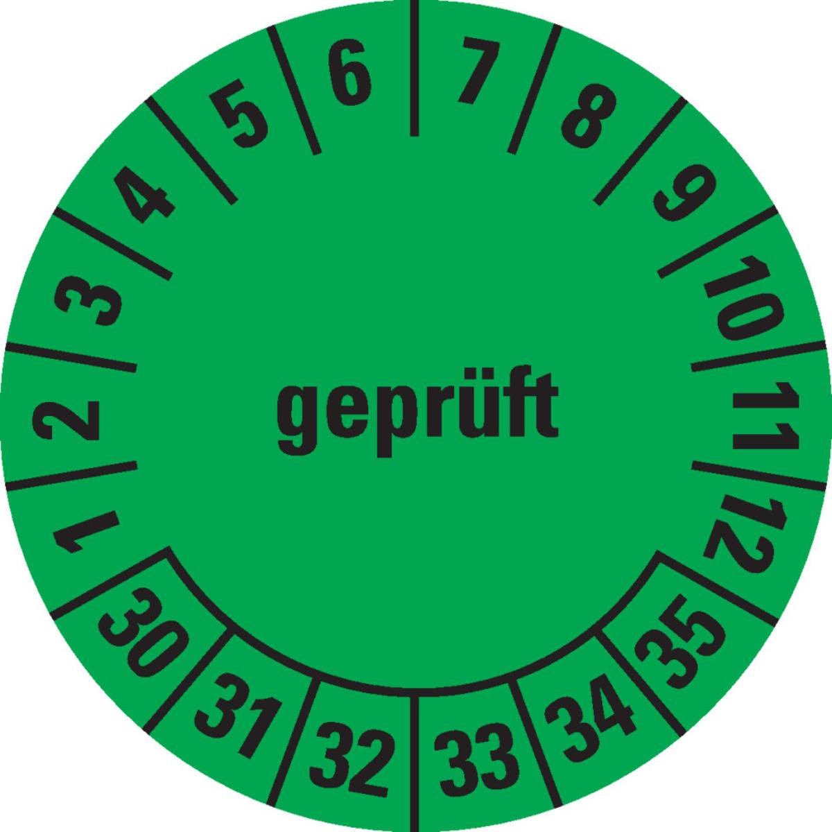 Das Bild zeigt einen grünen runden Inspektionsaufkleber mit 