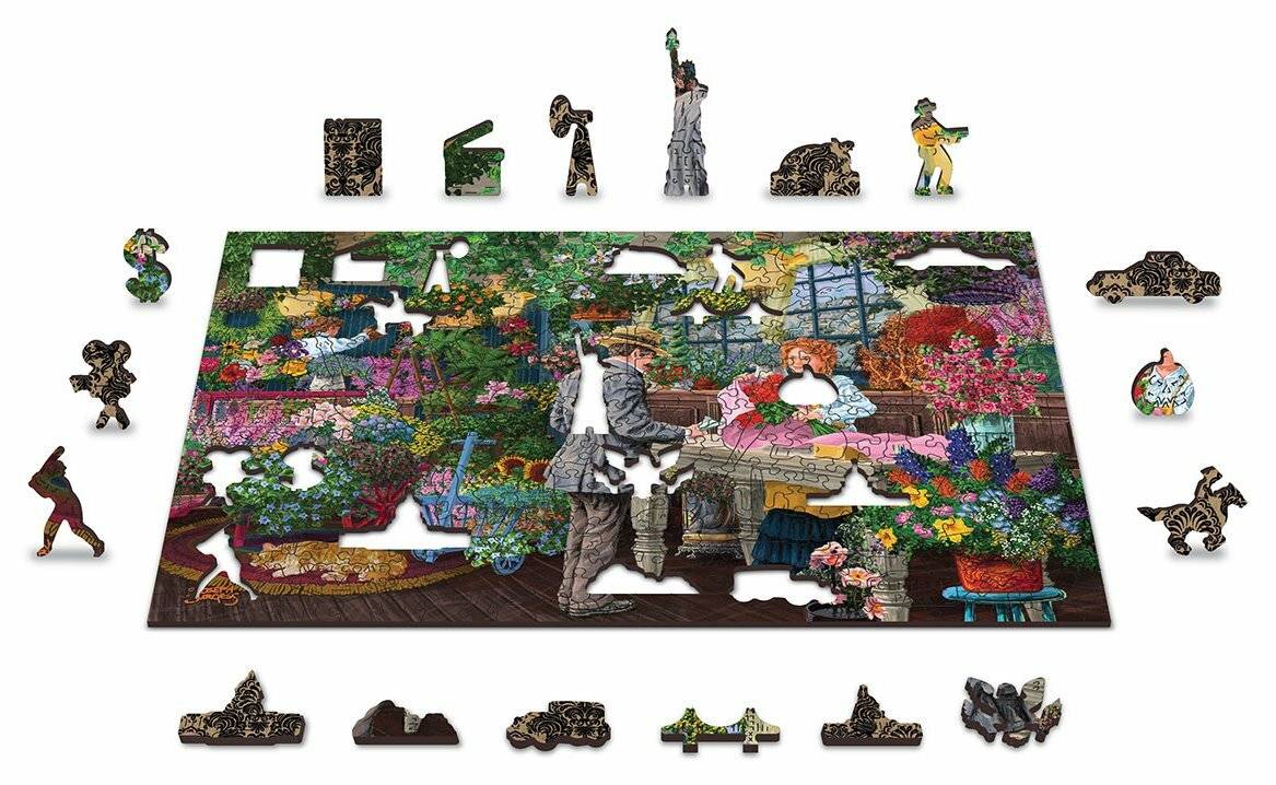 Ein buntes Puzzle mit einer Innengarten-Szene, auf der eine Person Blumen an einem Tisch malt. Einzigartige Puzzle-Teilformen umgeben das Bild.