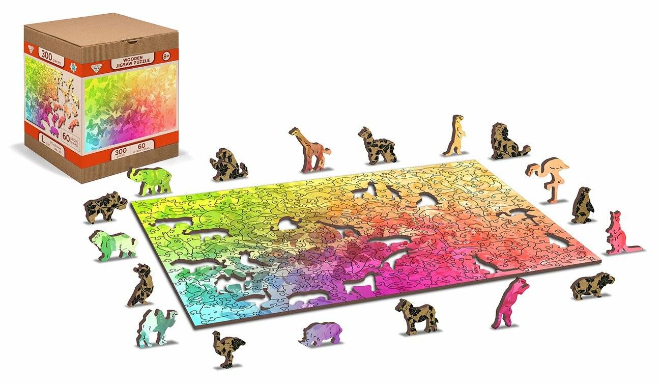Puzzle mit tierförmigen Teilen auf mehrfarbigem Farbverlaufhintergrund. Box mit der Bezeichnung „100 Teile