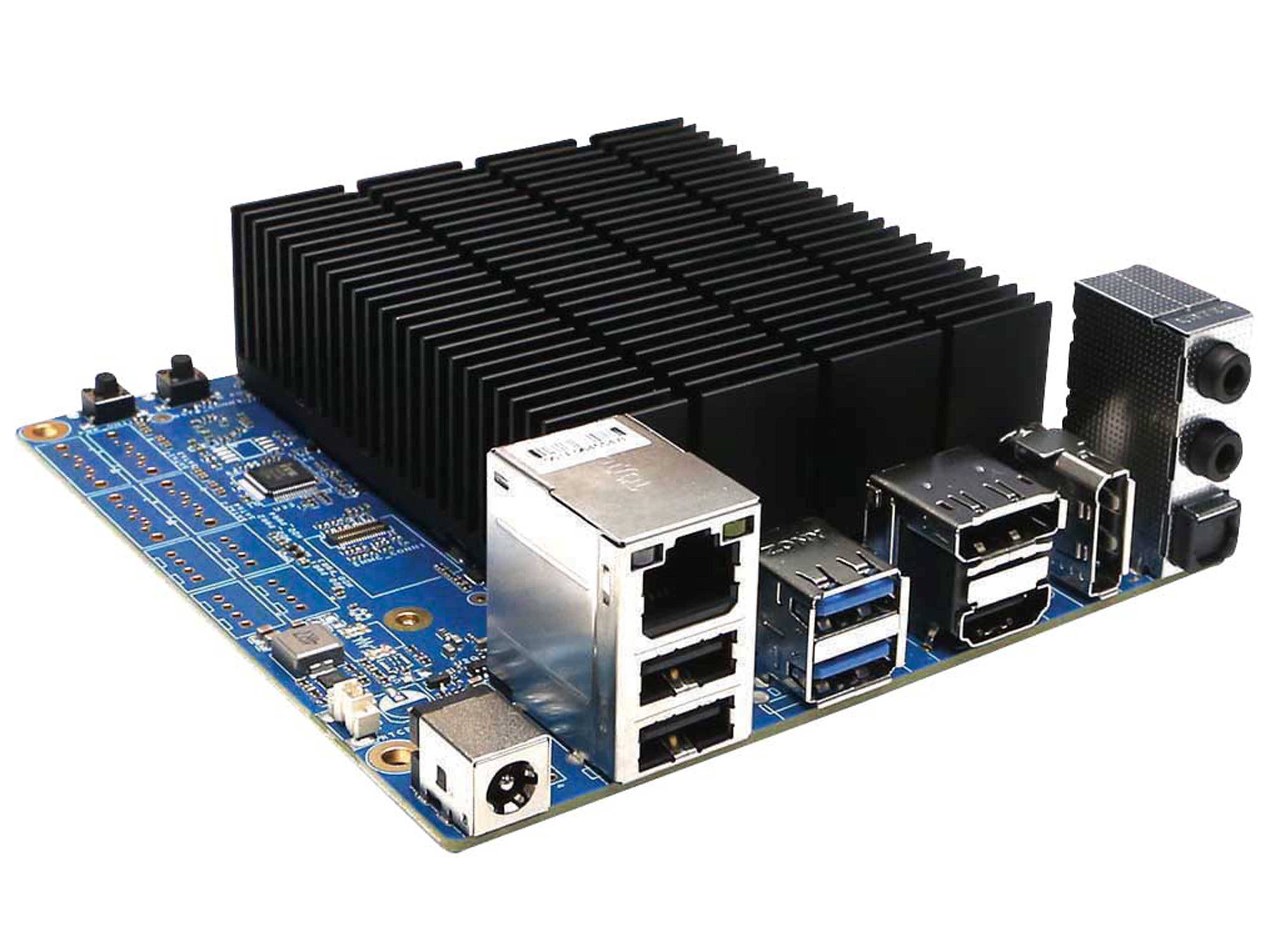 Ein blauer Computer-Schaltkreis mit einem großen schwarzen Kühlkörper, mehreren USB-Anschlüssen, Ethernet-Anschlüssen und einem Stromstecker.