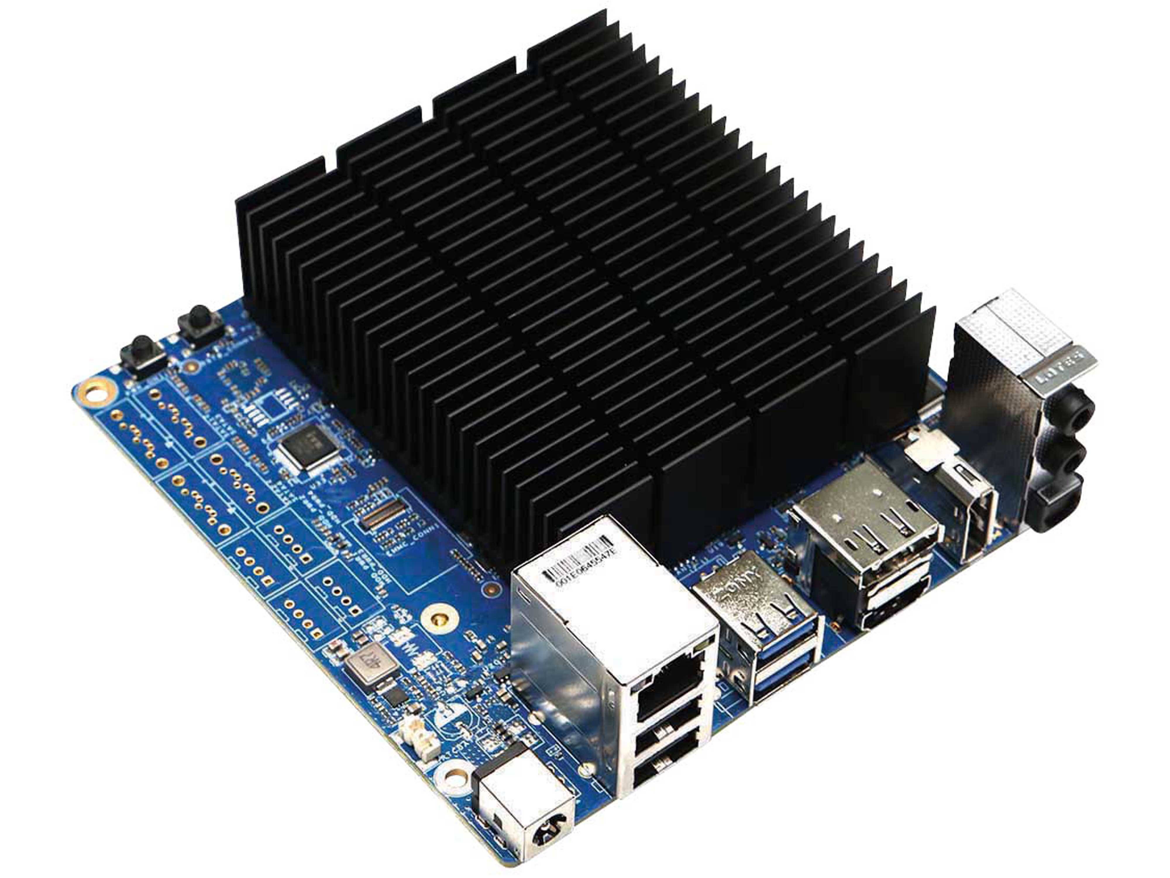 Eine blaue Leiterplatte mit einem großen schwarzen Kühlkörper und verschiedenen Anschlüssen, einschließlich USB und Ethernet, was auf ein Computergerät hindeutet.